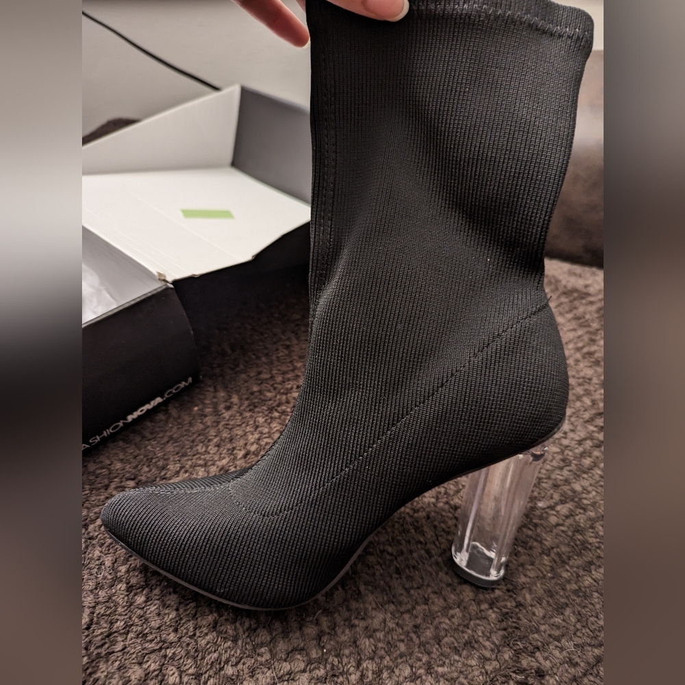 Black booties with clear heel